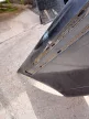 BMW E39 sedan fekete hátsó lökhárító - sérült 